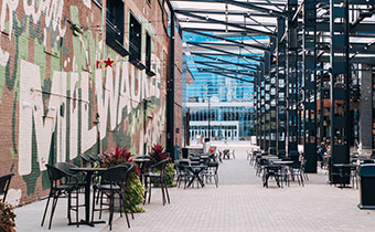 chairs and tables outside of Fiserv Forum